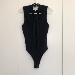 Black sleeveless bodysuit with neck tie